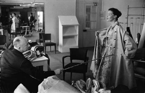 christian dior ateliers modeles sas|Christian Dior in his atelier in 10 rare vintage photos.